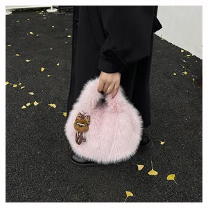 Winter sweet plush handbag for women, soft fluffy round fuzzy tote bag with cute pendant.