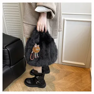 Winter black fluffy handbag for women, cute plush faux fur tote bag with lovely charm.
