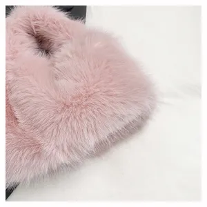 Pink faux fur handbag detail view, soft plush material, sweet winter women purse style.
