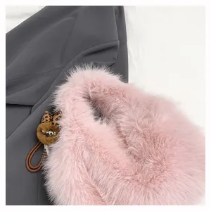 Pink fluffy handbag, winter faux fur tote bag for women, stylish soft plush shoulder bag.