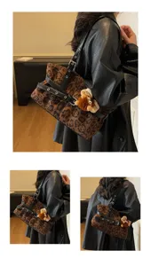 Detail shot of retro leopard print suede shoulder bag with chic black leather straps.