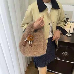 Winter plush handbag for women, sweet furry tote bag with cute doll pendant, fuzzy fashion bag.