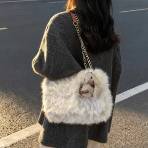 Winter plush crossbody bag for women, fluffy fuzzy shoulder bag with cute chain strap.