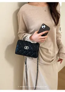 Black quilted chain shoulder bag, stylish retro crossbody bag with silver hardware.