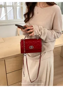 Red quilted chain crossbody bag for women, stylish vintage shoulder bag with metal strap.