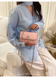 Pink quilted chain shoulder bag for women, stylish cross-body bag with chic silver hardware.
