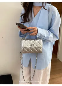 Silver quilted chain shoulder bag, classic luxury crossbody bag, stylish retro square handbag.