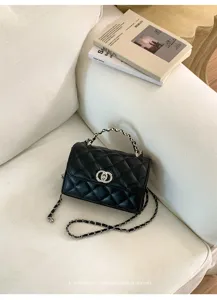 Black quilted chain shoulder bag, elegant cross-body handbag with retro metal clasp design.