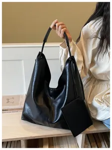 Black soft leather tote bag for women, large capacity slouchy hobo shoulder bag for daily commute.