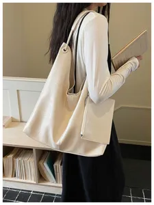 Stylish minimalist PU leather slouchy tote bag for women, large capacity casual shoulder bag.