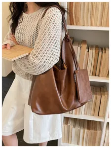Retro soft leather minimalist large capacity tote bag for women, casual commuter shoulder bag.