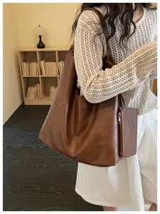 Retro soft leather large capacity tote bag, casual underarm shoulder bag for women daily commute.