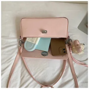 Stylish pink PU leather crossbody bag for women, trendy small square shoulder bag everyday use.
