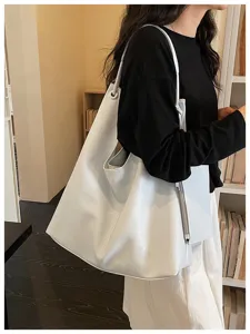 Minimalist soft leather tote bag for women, large capacity casual shoulder bag for daily commuting.