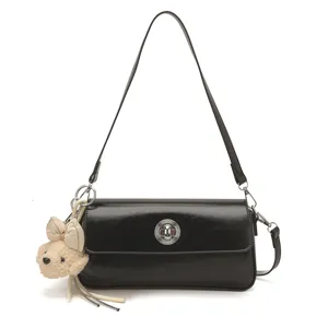 Trendy black women shoulder bag, chic PU leather crossbody bag with cute bear pendant.