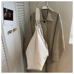 Minimalist soft leather large capacity tote bag for women, casual underarm single shoulder bag.