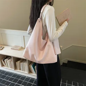 Pink soft leather hobo bag for women, large capacity stylish casual shoulder tote for daily commute.