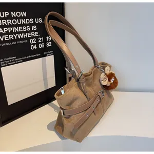 Winter vintage brown suede shoulder underarm bag with metal buckles and cute plush charm.