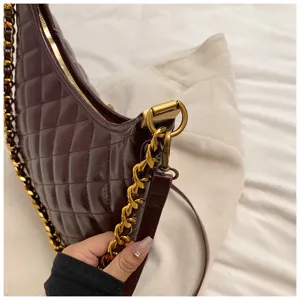 Quilted chain shoulder bag for women, stylish wine red underarm bag with gold hardware.