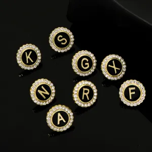 Vintage rhinestone letter brooch pin, elegant gold alloy crystal alphabet badge for women.