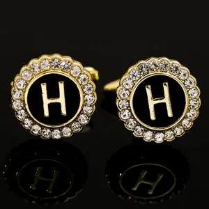 Vintage gold tone rhinestone letter H brooch pin, elegant palace style black crystal badge.