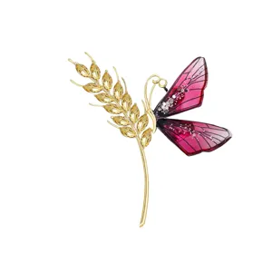 Exquisite golden wheat ear and pink butterfly wing brooch, elegant alloy rhinestone suit corsage pin.