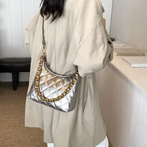 Silver quilted shoulder bag for women, trendy metallic hobo handbag with chic chunky gold chain.