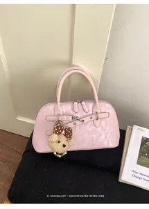 Sac à main coquillage rétro rose pour femme, sac porté épaule minimaliste et élégant.