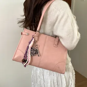 Pink vintage large capacity shoulder tote bag for women, stylish casual commuting daily bag.