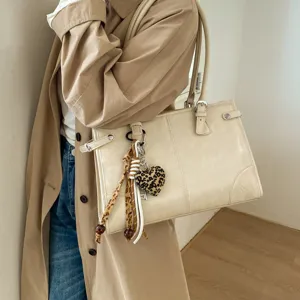 Beige retro large capacity tote bag women stylish commuting shoulder bag with leopard charm