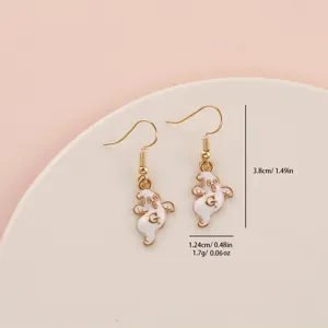 Halloween ghost earrings detail view, cute alloy white enamel spooky jewelry for women and girls.