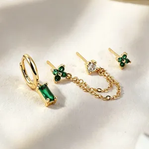 Gold plated three-piece earring set featuring green stone hoop and clover studs for daily wear