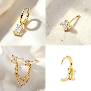 Gold plated 3-piece earring set featuring a chic rectangular hoop, clover stud, and double chain.