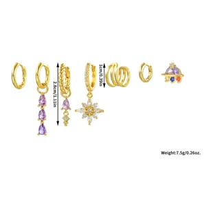 Set de boucles d'oreilles plaqué or avec pendentifs fleurs cristaux violets et pinces.