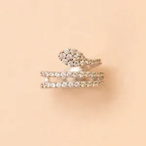 Silver snake ear cuff with sparkling cubic zirconia, chic minimalist wrap design for women.