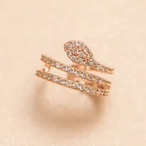 Close-up detail of the rose gold CZ pave snake ear cuff, showing exquisite coiled design.
