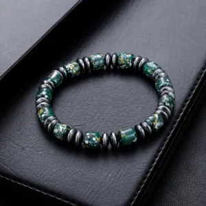 Bracelet de perles tachetées vertes avec perles d'espacement métalliques accessoire unisexe.