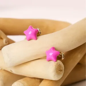Pink enamel star stud earrings for women, copper alloy metal chic jewelry gift.