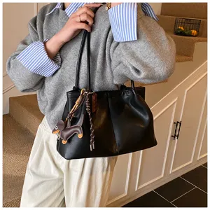 Black leather tote bag for women, large capacity shoulder bag with cute dachshund charm.