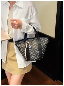 Stylish women's plaid bucket handbag, versatile tote bag with top handles for daily commute.