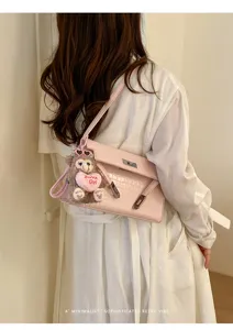Pink crocodile pattern shoulder bag with cute bear pendant, retro stylish daily handbag.