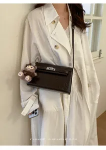 Retro crocodile pattern shoulder bag with cute bear pendant, stylish women retro Kelly bag.