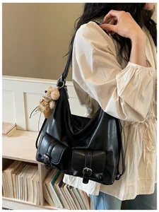 Retro textured large-capacity women's shoulder bag and versatile backpack detail view.