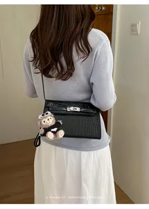 Black crocodile embossed retro shoulder bag with cute plush bear pendant for women daily chic style