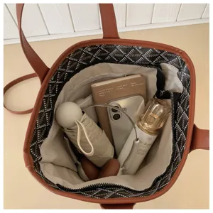Korean style large capacity tote bucket bag with chevron pattern for women daily commute.