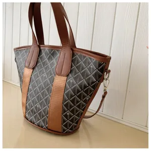 Stylish women bucket handbag with classic chevron pattern, large capacity for daily commute.