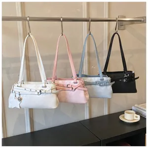 Chic minimalist shoulder underarm bag for women, trendy commuter PU leather tote handbag.