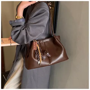 Brown PU leather tote bag for women, large capacity shoulder bag with cute charms.