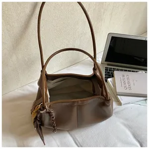 Brown leather tote bag for women, large capacity casual commuter handbag, simple shoulder bag.