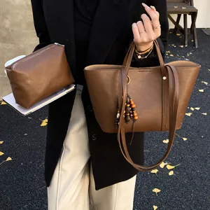 Vintage vintage καφέ PU δερμάτινη τσάντα tote με ασορτί τσαντάκι καλλυντικών για γυναίκες.